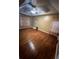 Spacious bedroom with hardwood floors, ceiling fan, and neutral paint, creating a comfortable and relaxing atmosphere at 2347 Fawn Hollow Ct, Duluth, GA 30096