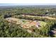 A new construction community provides picturesque views of the surrounding lush green forest at 6100 Marigold Way, Atlanta, GA 30349