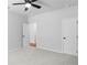 Spacious bedroom with neutral carpet and ceiling fan at 6100 Marigold Way, Atlanta, GA 30349