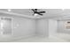 Large bedroom with bright windows, ceiling fan and neutral carpet at 6100 Marigold Way, Atlanta, GA 30349