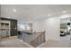 Upstairs hallway with a view to the laundry room and an open bedroom at 6100 Marigold Way, Atlanta, GA 30349