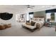 Spacious main bedroom boasts a sitting area, neutral decor, and a ceiling fan at 6100 Marigold Way, Atlanta, GA 30349