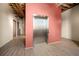 Building elevator, providing accessible transportation to all floors, with wood floors in the hallway at 1596 Cleveland Ave # 204, Atlanta, GA 30344