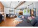 Spacious living area featuring an open floorplan, exposed brick, and modern decor at 1596 Cleveland Ave # 204, Atlanta, GA 30344