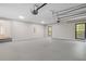 Spacious two-car garage with ample room for vehicles and storage, featuring natural lighting at 280 Old Carrollton Rd, Carrollton, GA 30116