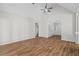 Open-concept living space with hardwood floors, high ceilings, and neutral paint at 280 Old Carrollton Rd, Carrollton, GA 30116