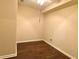 Small room with wood flooring, featuring a ceiling fan and minimal decor at 5122 Micaela Way, Duluth, GA 30096