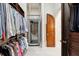 Custom closet with clothing lift and access to Primary bathroom at 811 Flathead Pass, Suwanee, GA 30024