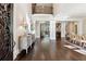 Grand foyer with a soaring ceiling, hardwood floors, and elegant decor at 811 Flathead Pass, Suwanee, GA 30024