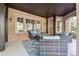 Comfortable outdoor area with brick floor and wicker seating at 811 Flathead Pass, Suwanee, GA 30024