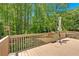 Spacious deck with wood railing, perfect for outdoor entertaining at 4309 Milford Pl, Hoschton, GA 30548