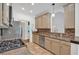 Well-lit kitchen with granite countertops, mosaic backsplash, stainless steel appliances, and neutral-toned cabinetry at 4309 Milford Pl, Hoschton, GA 30548