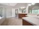 Spacious primary bathroom with double vanity, soaking tub, and separate shower at 5737 Russell Ct, Douglasville, GA 30135