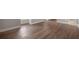 Bedroom featuring hardwood floors, looking toward the bathroom at 5737 Russell Ct, Douglasville, GA 30135
