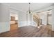 Open-concept dining room with hardwood floors and views of the kitchen at 5737 Russell Ct, Douglasville, GA 30135