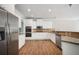 Well-equipped kitchen with stainless steel appliances and custom cabinetry at 5737 Russell Ct, Douglasville, GA 30135