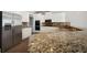 Modern kitchen featuring granite countertops and stainless steel refrigerator at 5737 Russell Ct, Douglasville, GA 30135