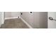 Tiled laundry room with hookups ready for a washer and dryer at 5737 Russell Ct, Douglasville, GA 30135