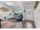 Stylish living room with modern decor and ample natural light at 6070 Arbor Green Cir, Sugar Hill, GA 30518