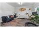 Elegant living room showcasing modern furniture, decor, and bright lighting at 6070 Arbor Green Cir, Sugar Hill, GA 30518