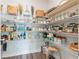 Well-organized pantry with wire shelving providing ample storage space for food and kitchen items at 6070 Arbor Green Cir, Sugar Hill, GA 30518