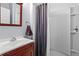 Bathroom with vanity, toilet, shower with curtain, and fixtures at 1723 Highlands Se Vw, Smyrna, GA 30082