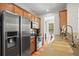 Well-lit kitchen with stainless steel appliances and hardwood flooring at 1723 Highlands Se Vw, Smyrna, GA 30082