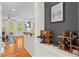 Open-concept living area with hardwood floors, a bar area, and tons of natural light at 1723 Highlands Se Vw, Smyrna, GA 30082