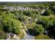 Neighborhood aerial view featuring tree-lined streets and well-maintained homes in a desirable community at 20 Old Oak Ct, Covington, GA 30016