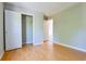 Bright bedroom with hardwood floors and a closet, perfect for comfortable living at 20 Old Oak Ct, Covington, GA 30016