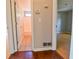 Hallway with neutral paint leading to the bathroom and bedroom, showcasing the home's flow at 20 Old Oak Ct, Covington, GA 30016
