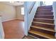 A stairway leading to a second floor offers a glimpse into a light-filled living space at 20 Old Oak Ct, Covington, GA 30016