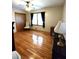 Bedroom with hardwood floors, ample natural light, and neutral-toned walls at 3556 Forest Hill Rd, Powder Springs, GA 30127