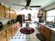 Traditional kitchen with ample cabinets, stainless appliances, and adjacent dining area at 3556 Forest Hill Rd, Powder Springs, GA 30127