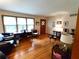 Inviting living room featuring hardwood floors and a comfortable layout at 3556 Forest Hill Rd, Powder Springs, GA 30127
