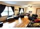 Spacious living room with hardwood floors and abundant seating at 3556 Forest Hill Rd, Powder Springs, GA 30127
