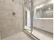 Tile shower with white vanity at 1227 Fern Ridge Ct # 17, Norcross, GA 30093