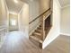 Welcoming entryway with hardwood floors, stairway and lots of natural light at 1227 Fern Ridge Ct # 17, Norcross, GA 30093