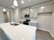 Modern kitchen featuring an island, subway tile, and stainless steel appliances at 1227 Fern Ridge Ct # 17, Norcross, GA 30093