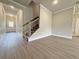 Spacious living room with beautiful floors and staircase at 1227 Fern Ridge Ct # 17, Norcross, GA 30093
