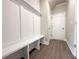 Mudroom with built-in bench and storage at 1227 Fern Ridge Ct # 17, Norcross, GA 30093