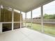 Spacious screened porch offering backyard views, a perfect spot for relaxation at 1227 Fern Ridge Ct # 17, Norcross, GA 30093
