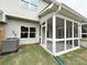 Exterior view of the screened in porch and the level back yard at 1227 Fern Ridge Ct # 17, Norcross, GA 30093