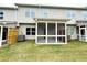A covered patio with yard offers a relaxing outdoor living space at 1237 Fern Ridge Ct # 18, Norcross, GA 30093