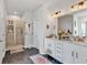 Bathroom with double vanity, walk-in shower, and modern fixtures at 173 Bramlett Ridge Dr, Dallas, GA 30157