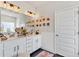 Bathroom with a double vanity, decorative lighting, and stylish decor at 173 Bramlett Ridge Dr, Dallas, GA 30157