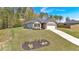 Charming single-story home with brick accents, well-manicured landscaping, and an attached garage at 173 Bramlett Ridge Dr, Dallas, GA 30157