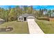 Charming single-Gathering home featuring a well-manicured lawn and inviting front porch at 173 Bramlett Ridge Dr, Dallas, GA 30157