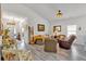 Open-concept living room with hardwood floors, stylish furnishings, and plenty of natural light at 173 Bramlett Ridge Dr, Dallas, GA 30157