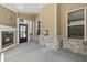 A cozy covered patio features a fireplace and provides an inviting outdoor living space at 1602 Dover Creek Ln, Lawrenceville, GA 30045